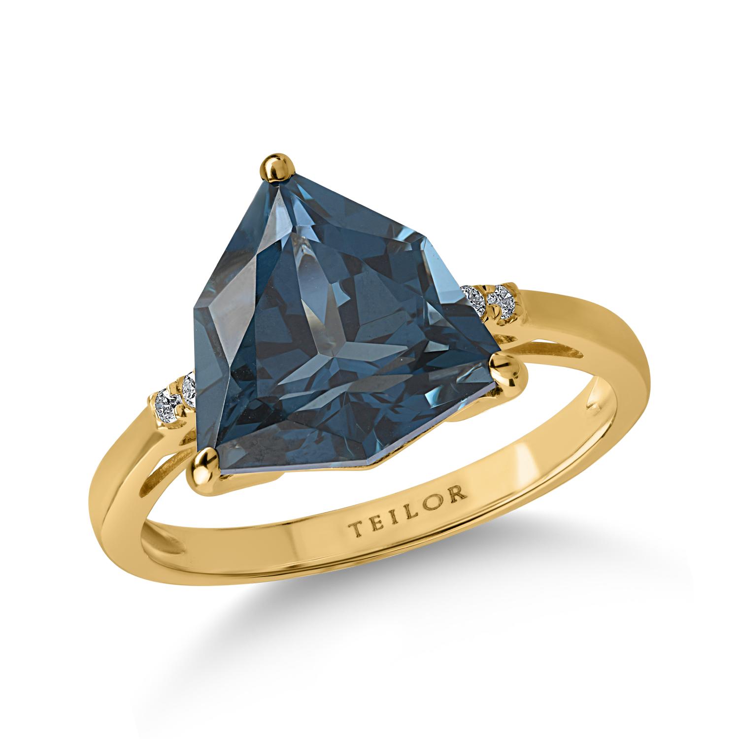 Sárga arany gyűrű 5ct Londoni kék topázzal és 0.03ct gyémántokkal